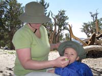 41-Mommy_feeding_Kenny_while_he_stands_up