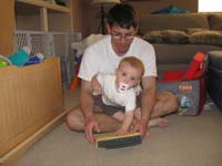 01-Kenny_and_Daddy_looking_at_a_book