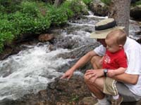 037-Daddy_shows_Kenny_the_river