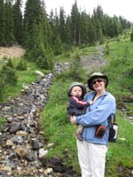 067-Mommy_and_Kenny_by_a_cascading_waterfall
