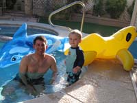 14-Kenny_and_Daddy_in_the_pool_at_Xavier's