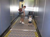03-Kenny_and_Daddy_walking_to_the_plane