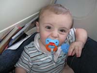 07-Kenny_would_rather_be_on_the_floor_than_Mommy's_lap