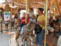 59-Kenny_Mommy_and_Baba_on_the_carousel