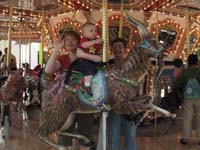 61-Kenny_Mommy_and_Baba_on_the_carousel