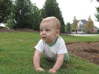 17-Kenny_likes_playing_in_the_pine_straw_and_grass