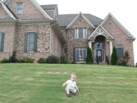 18-Kenny_in_front_of_Grammy_and_Grampa_Duke's_house