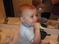 22-Kenny_brushing_his_teeth_by_himself