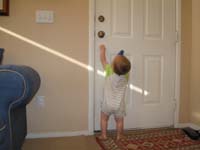 21-Kenny_can_reach_the_door_knob_on_his_tippy_toes