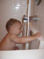 26-Kenny_wants_to_drink_the_water_while_taking_a_bath