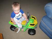 36-Kenny_and_his_purse_go_for_a_ride-the_purse_costs_more_than_the_ATV