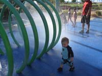 27-Kenny_playing_with_the_water