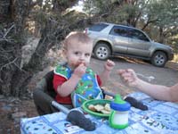 05-Kenny_eating-our_new_Toyota_4Runner_in_background