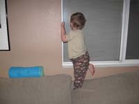 14-what_are_the_neighbors_watching_on_their_garage_TV