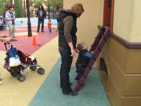 34-Kenny_thinks_the_rope_ladder_is_doable-Penn_of_Penn_and_Teller_with_daughter_in_background