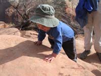 33-Kenny_checking_out_the_rock_at_Scout's_Lookout