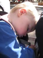 69-Kenny_sleeps_while_we_wait_for_the_shuttle