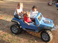 77-Kenny_taking_a_ride_with_the_babes-Rian_and_Frankie