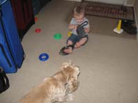 002-Kenny_tries_to_put_on_Duke's_shoes