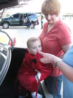 085-putting_Kenny's_costume_on_in_the_Springs_Preserve_parking_lot