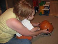 110-Mommy_and_Kenny_make_Jack_O'_Lantern_face