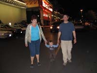 18-Julie_Kenny_and_Daddy_walking_through_parking_lot_from_Palace_Station