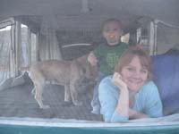 042-Mommy_Kenny_and_Baxter_hanging_out_in_the_camper_bed