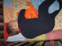 59-Kenny_sound_asleep-arms_wrapped_around_Deepo