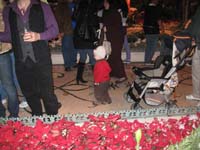 024-Kenny_amongst_the_crowd_as_Daddy_follows_with_the_stroller
