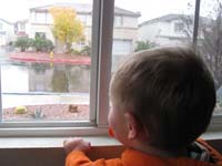 036-Kenny_watches_the_snow_through_the_front_window