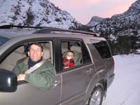 063-Daddy_and_Kenny_enjoying_the_ride-27_degrees_outside-about_8_inches_of_snow