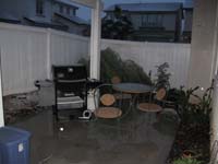 086-our_backyard-snow_accumulating_on_the_fence