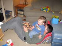 101-new_way_of_reading_to_Kenny-block_Daddy's_view_of_the_book