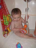 139-Kenny_playing_with_his_new_bath_toys