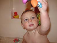 141-Kenny_playing_with_his_new_bath_toys
