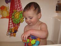 142-Kenny_playing_with_his_new_bath_toys