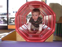 10-Kenny_crawling_through_the_tunnel