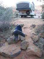 43-Kenny_climbing_rocks_on_his_way_back_to_camp-did_this_over_and_over_again