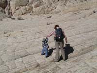 53-Mommy_helps_Kenny_through_a_steep_section
