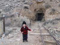 21-Kenny_in_front_of_the_Eureka_Mine