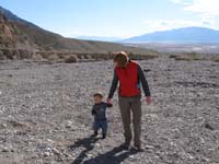 71-Kenny_and_Mommy_walking_in_a_big_wash