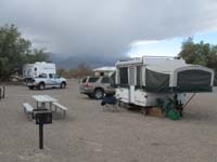 76-our_campsite_with_approaching_storm_in_background