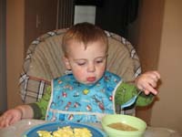 10-Kenny_doesn't_have_much_of_an_appetite_for_once_in_his_life-applesauce_feels_good_on_his_throat