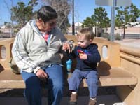 08-Kenny_sits_with_Baba_and_has_a_snack
