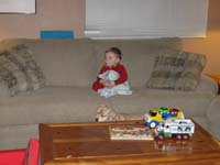 12-Kenny's_favorite_spot_is_the_middle_of_the_big_couch