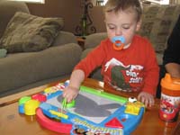 31-Kenny_plays_with_his_Doodle_Pro