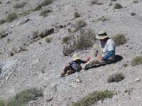 32-Kenny_trying_to_slide_down_the_hill_while_Daddy_holds_him_back