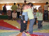 52-Amelie_giving_Kenny_a_hug-don't_let_Sierra_know-poor_Kenny_doesn't_know_what_to_do