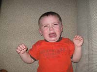 15-Kenny's_upset_because_there_are_no_pictures_on_the_camera_for_him_to_see