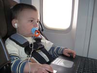 01-Kenny_all_tech'd_out-sign_of_what's_to_come-on_the_plane_to_Atlanta